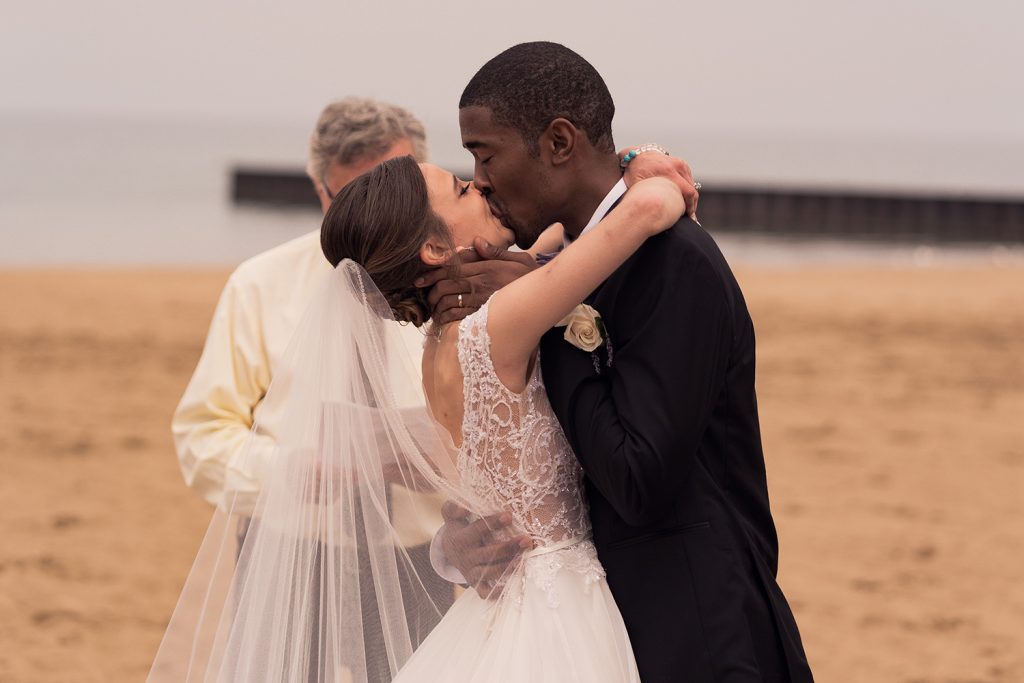 Bride and groom's first kiss as husband and wife