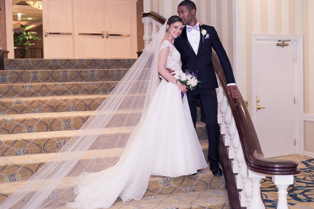 Bride and groom portrait in the Grand Ballroom of the Hilton Orrington in Evanston