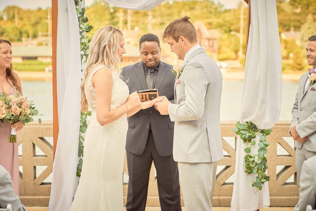 Bride and groom ring exchange during the wedding ceremony