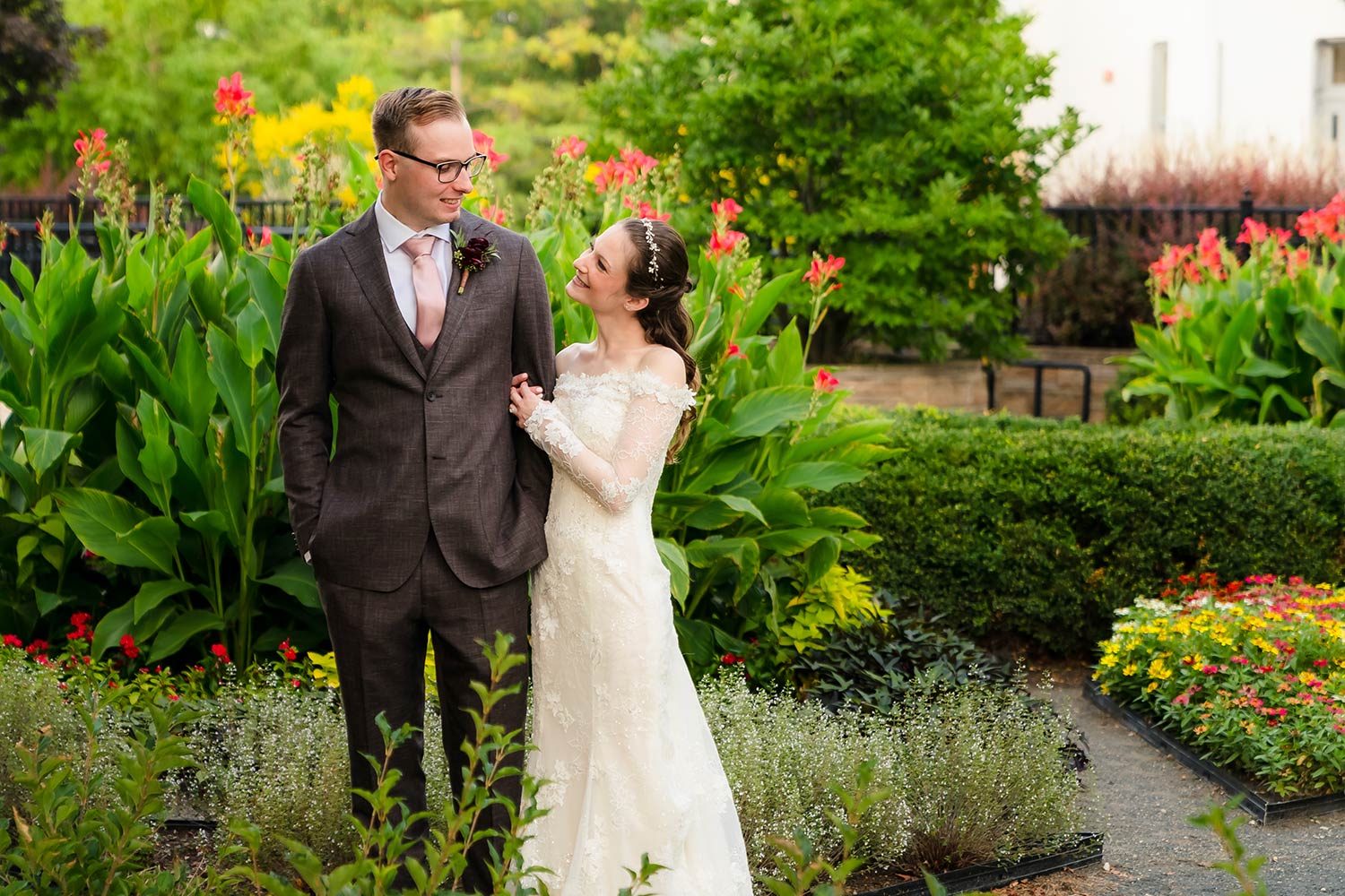 Bride and groom portrait in the Diana Nicholas Garden at Wilder Mansion in Elmhurst, IL