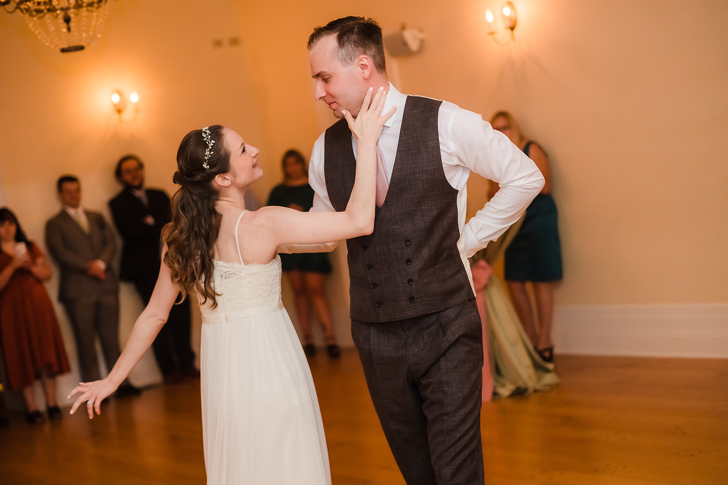 Bride and groom first dance during their reception at Wilder Mansion in Elmhurst, IL