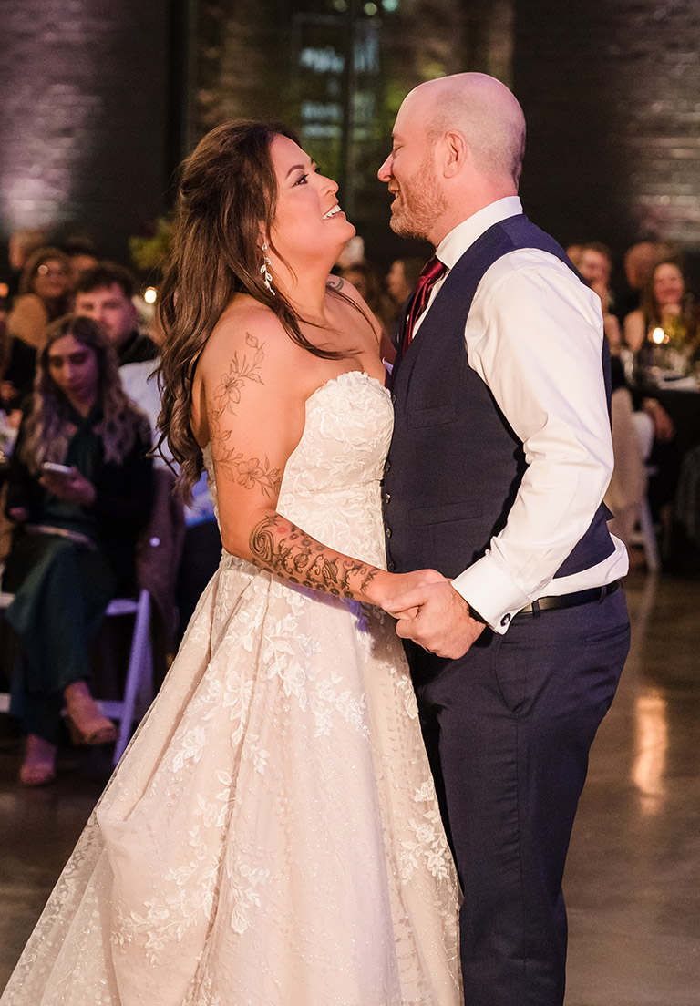 Bride and groom first dance during their reception at Prairie Street Brewing in Rockford, IL