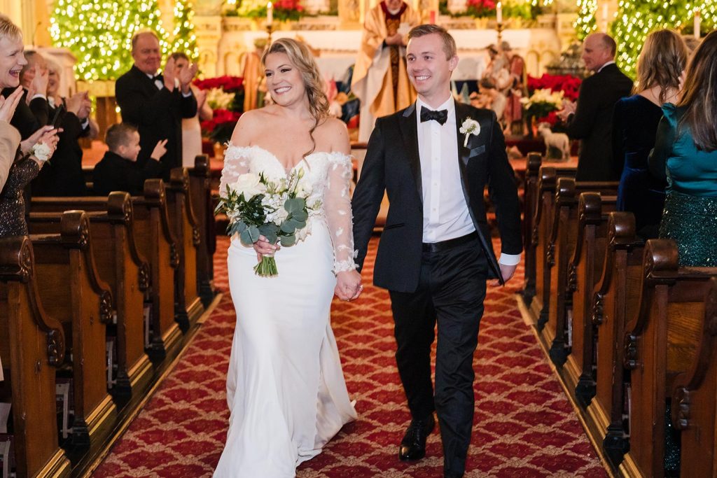 Bride and groom recessional at St. Michael in Old Town in Chicago, IL