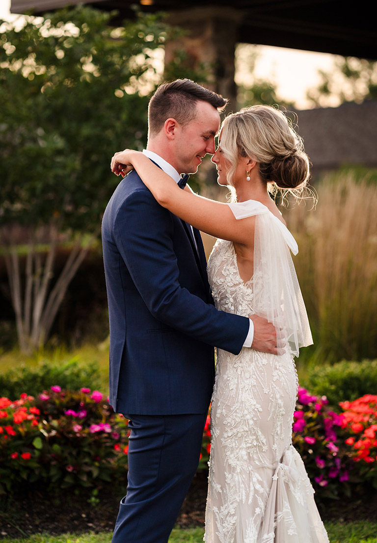 Bride and groom sunset portrait at Oak Brook Tennis & Bath Club in Oak Brook, IL