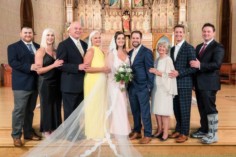 Family wedding portrait at St. Joseph Catholic Church in Chicago, IL