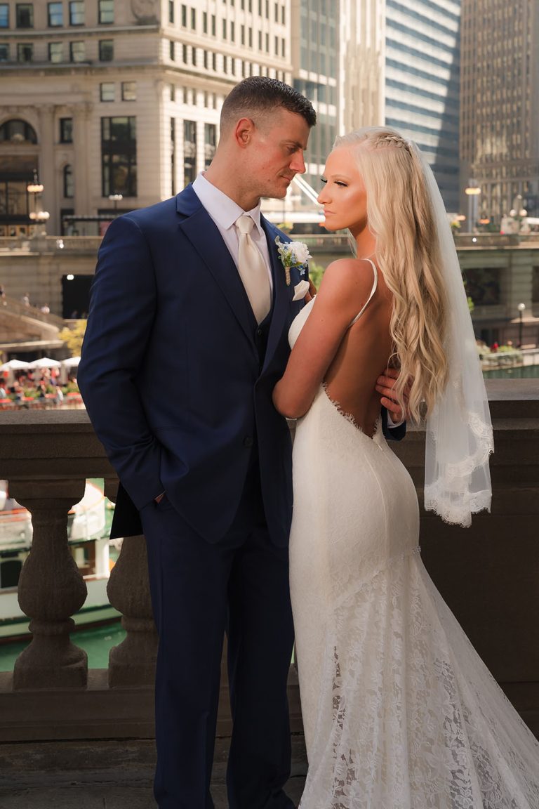 Bride and groom portrait at the Wrigley Building in Chicago, IL