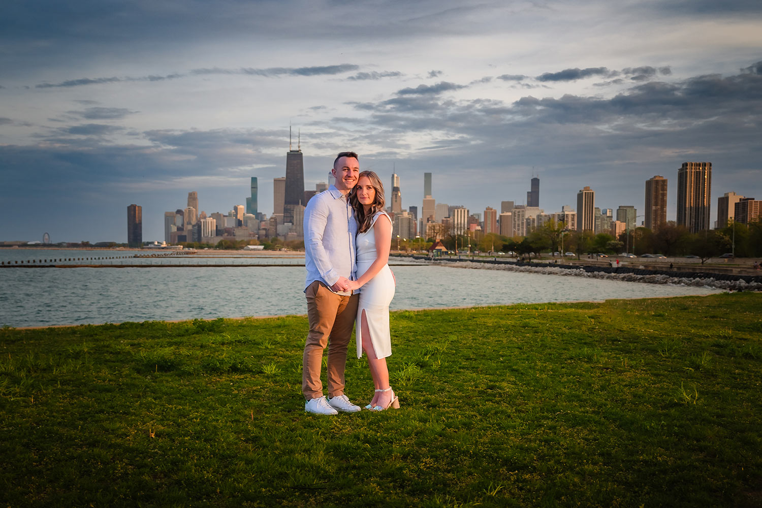 Engaged couple during their engagement session at North Avenue Beach in Chicago, IL
