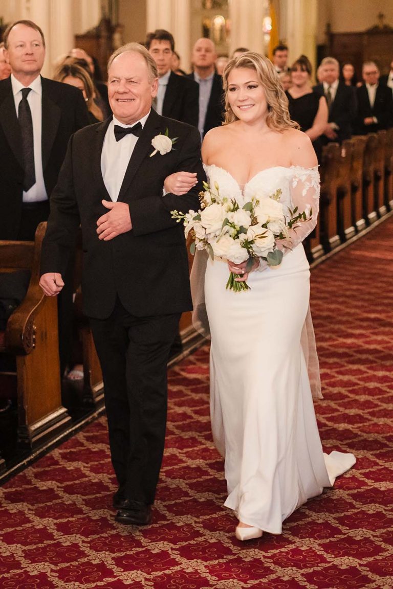 Father walks daughter down the aisle at St. Michael Catholic Church in Chicago, IL