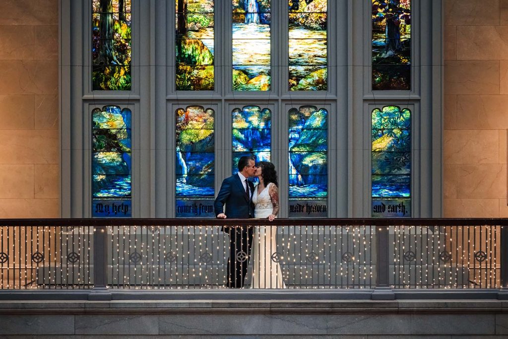 Bride and groom portrait at the Hartwell Memorial Window in the Art Institute of Chicago