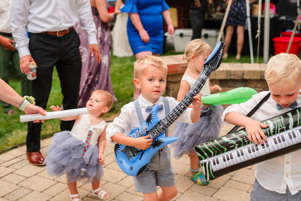 Family members provide entertainment for Nick and Kristen's wedding reception in Aurora, IL