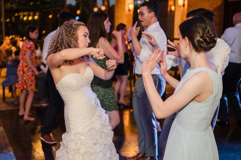 Bride dancing at her wedding reception at Glen Flora Country Club in Waukegan, IL