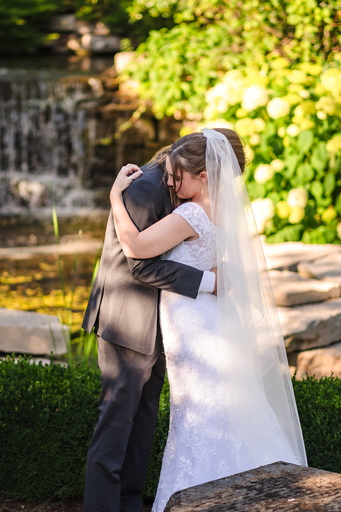 Bride and groom hugging at the Monte Bello Estate in Lemont, IL