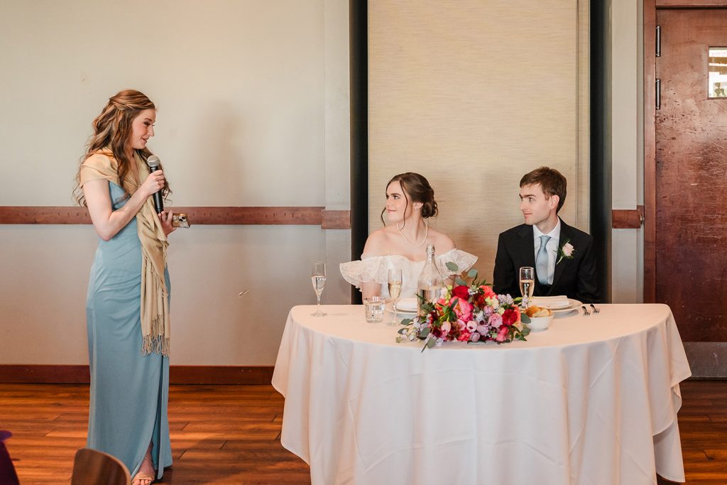 Maid of honor gives a wedding toast during the reception at Pinstripes in Oak Brook, IL