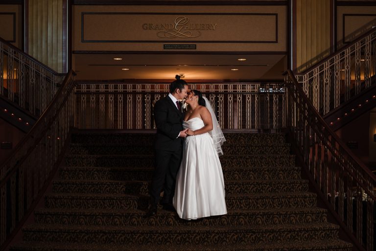 Bride and groom share a quiet portrait moment at Paramount Theatre in Aurora, IL
